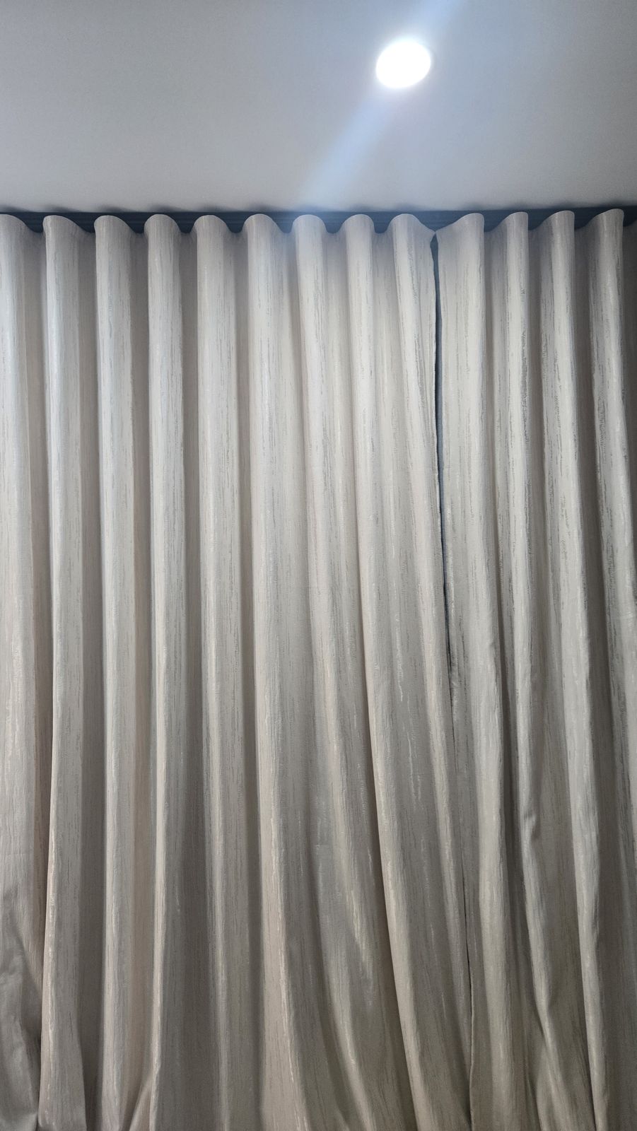 Wave fold chenille curtains, tailored in-house