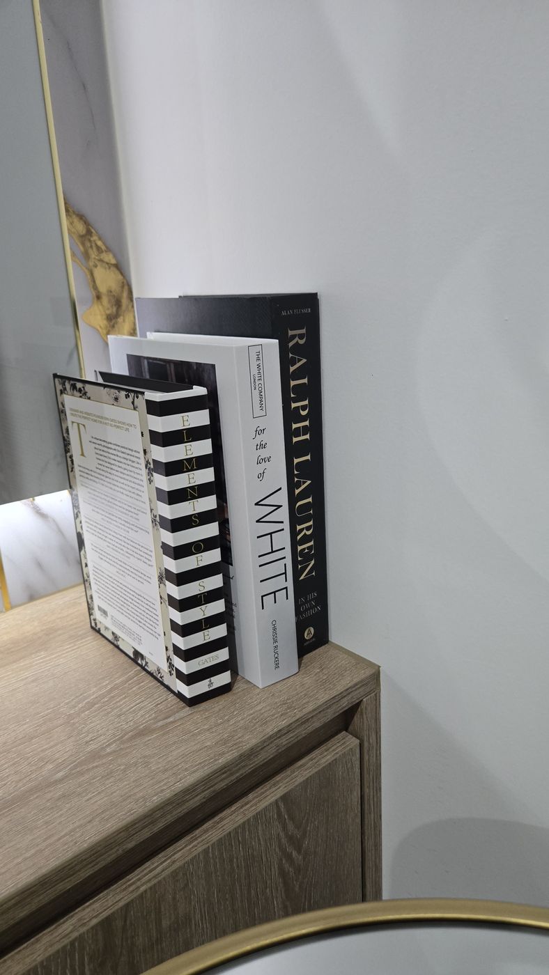 Curated stack of interior styling books